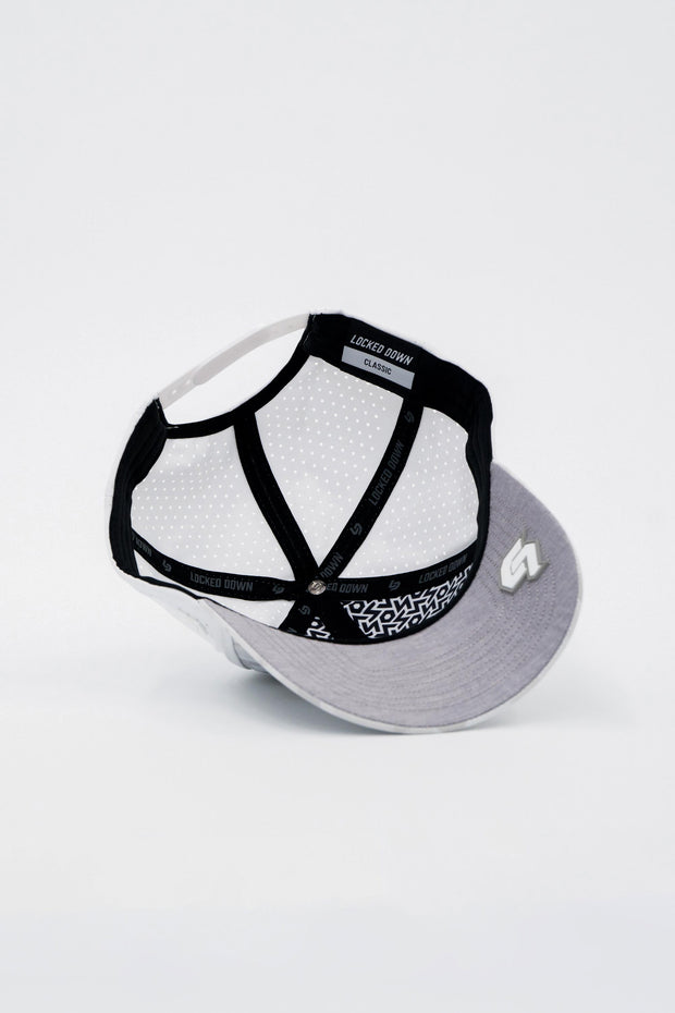 Locked Down Brands Premium Water Resistant CLASSIC Brand Snapback - Snow Camo | Under View