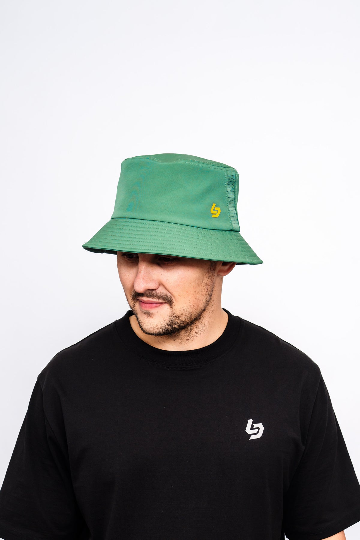 Locked Down Brands Premium Water Resistant Stamp Bucket Hat With Laser Holes - Green/Gold